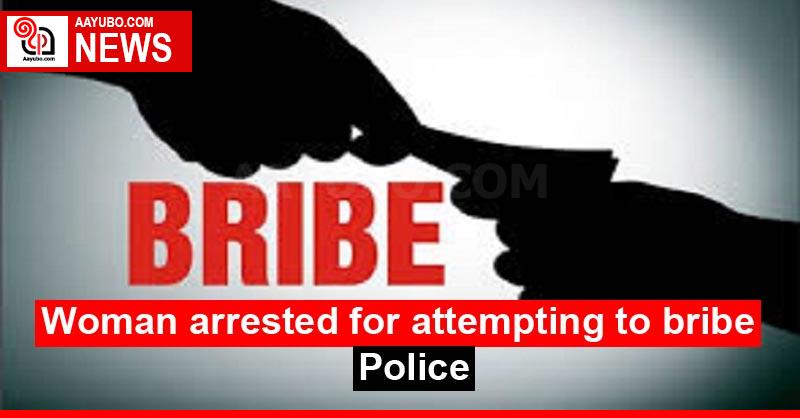 Woman arrested for attempting to bribe Police