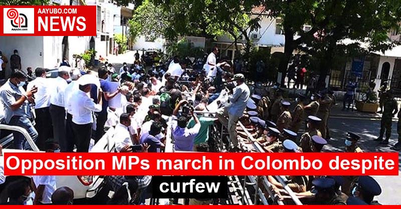 Opposition MPs march in Colombo despite curfew